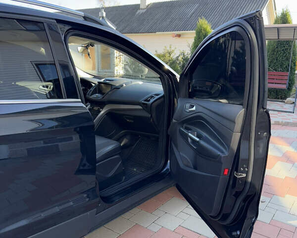 Черный Форд Эскейп, объемом двигателя 2 л и пробегом 95 тыс. км за 12500 $, фото 6 на Automoto.ua