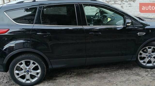 Черный Форд Эскейп, объемом двигателя 2 л и пробегом 140 тыс. км за 14000 $, фото 8 на Automoto.ua