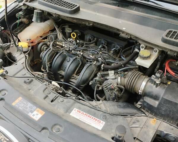 Черный Форд Эскейп, объемом двигателя 2.5 л и пробегом 190 тыс. км за 12500 $, фото 15 на Automoto.ua