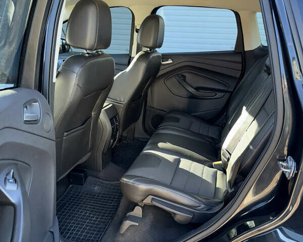 Черный Форд Эскейп, объемом двигателя 2 л и пробегом 95 тыс. км за 12500 $, фото 9 на Automoto.ua