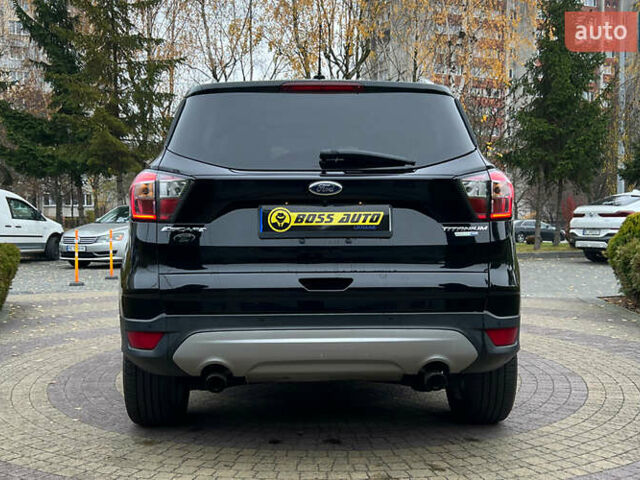 Черный Форд Эскейп, объемом двигателя 2 л и пробегом 151 тыс. км за 16600 $, фото 5 на Automoto.ua