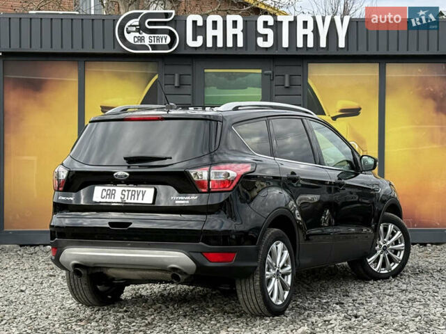 Черный Форд Эскейп, объемом двигателя 1.5 л и пробегом 146 тыс. км за 12700 $, фото 3 на Automoto.ua