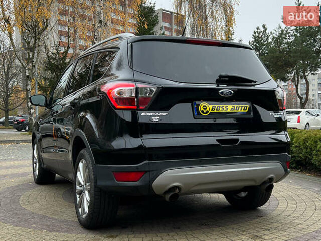 Черный Форд Эскейп, объемом двигателя 2 л и пробегом 151 тыс. км за 16600 $, фото 4 на Automoto.ua