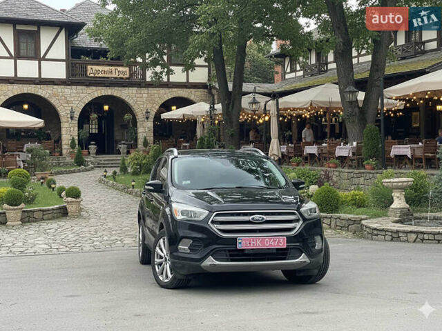 Черный Форд Эскейп, объемом двигателя 2 л и пробегом 276 тыс. км за 8450 $, фото 1 на Automoto.ua