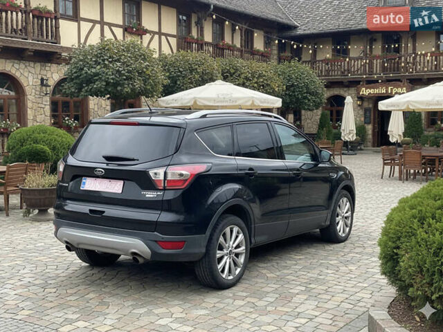 Черный Форд Эскейп, объемом двигателя 2 л и пробегом 276 тыс. км за 8450 $, фото 7 на Automoto.ua