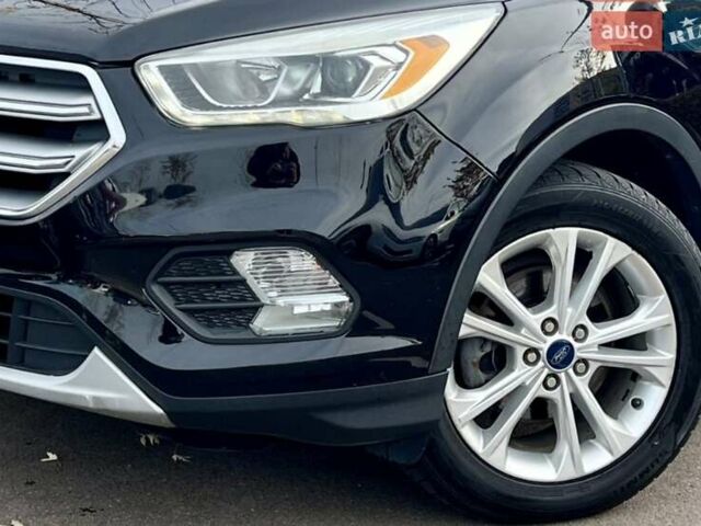 Черный Форд Эскейп, объемом двигателя 1.5 л и пробегом 187 тыс. км за 11700 $, фото 3 на Automoto.ua