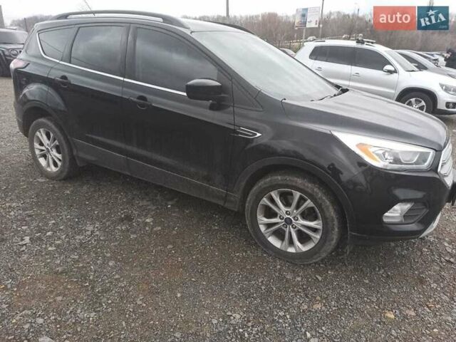 Черный Форд Эскейп, объемом двигателя 2 л и пробегом 147 тыс. км за 12500 $, фото 1 на Automoto.ua