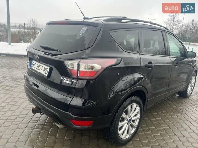 Черный Форд Эскейп, объемом двигателя 2 л и пробегом 111 тыс. км за 15400 $, фото 5 на Automoto.ua