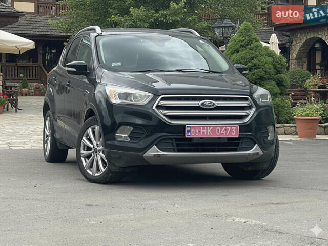 Черный Форд Эскейп, объемом двигателя 2 л и пробегом 276 тыс. км за 8450 $, фото 4 на Automoto.ua