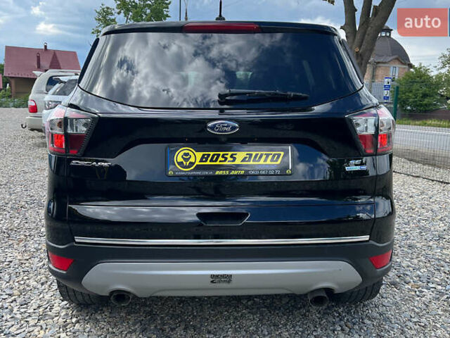 Черный Форд Эскейп, объемом двигателя 1.5 л и пробегом 128 тыс. км за 11999 $, фото 4 на Automoto.ua