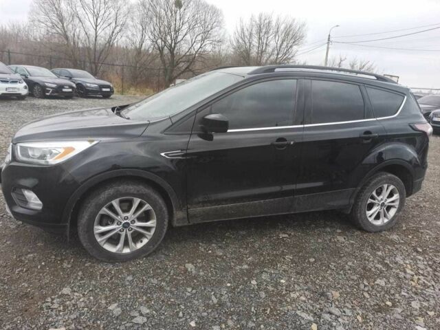 Черный Форд Эскейп, объемом двигателя 2 л и пробегом 147 тыс. км за 12500 $, фото 1 на Automoto.ua