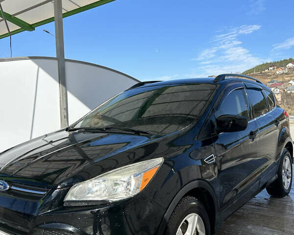 Чорний Форд Ескейп, об'ємом двигуна 2 л та пробігом 177 тис. км за 14002 $, фото 4 на Automoto.ua