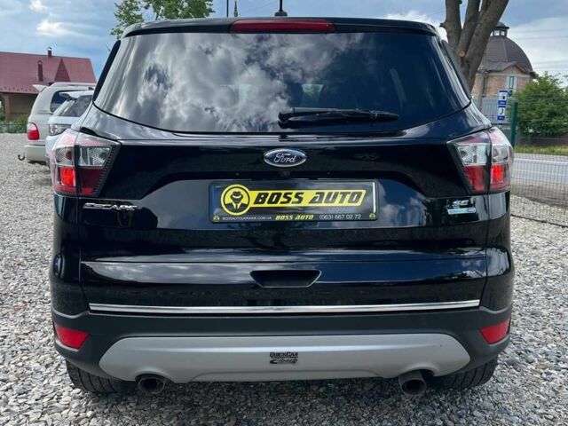 Черный Форд Эскейп, объемом двигателя 1.5 л и пробегом 128 тыс. км за 11999 $, фото 4 на Automoto.ua