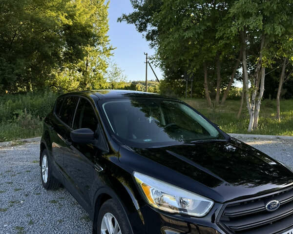 Черный Форд Эскейп, объемом двигателя 2 л и пробегом 63 тыс. км за 13200 $, фото 1 на Automoto.ua