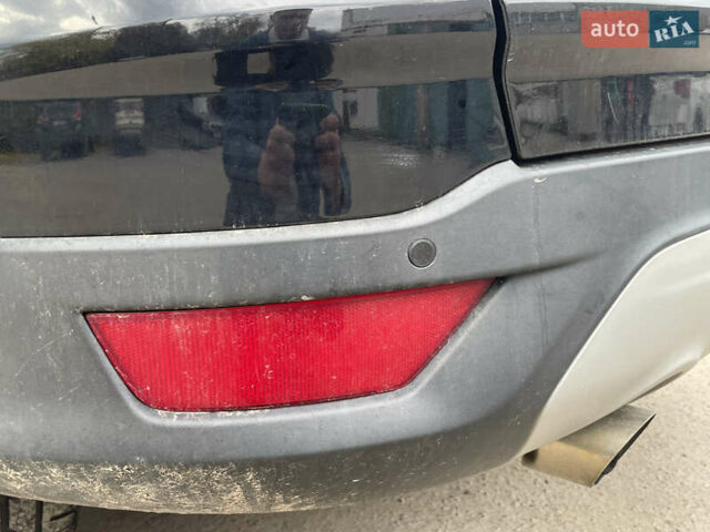 Черный Форд Эскейп, объемом двигателя 2 л и пробегом 276 тыс. км за 8450 $, фото 18 на Automoto.ua