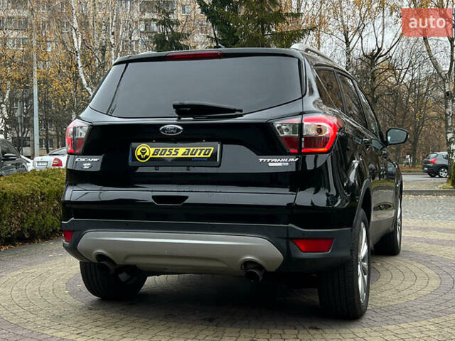 Черный Форд Эскейп, объемом двигателя 2 л и пробегом 151 тыс. км за 16600 $, фото 6 на Automoto.ua