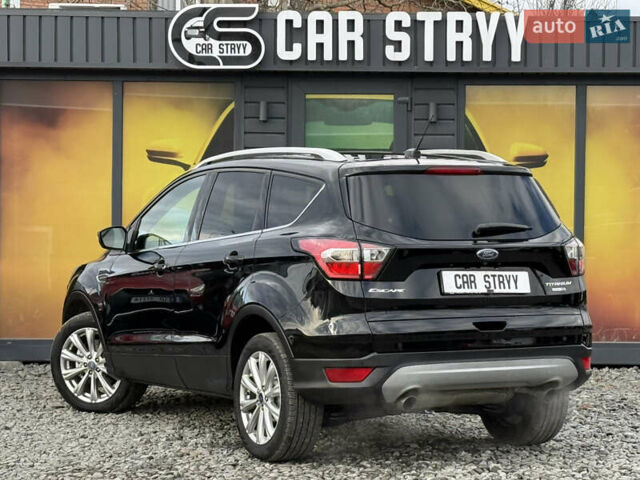 Черный Форд Эскейп, объемом двигателя 1.5 л и пробегом 146 тыс. км за 12700 $, фото 2 на Automoto.ua