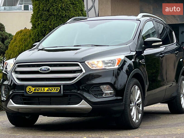 Черный Форд Эскейп, объемом двигателя 2 л и пробегом 151 тыс. км за 16600 $, фото 2 на Automoto.ua