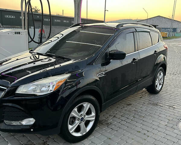 Чорний Форд Ескейп, об'ємом двигуна 2 л та пробігом 177 тис. км за 14002 $, фото 5 на Automoto.ua