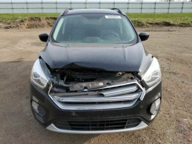 Черный Форд Эскейп, объемом двигателя 2 л и пробегом 120 тыс. км за 247 $, фото 4 на Automoto.ua