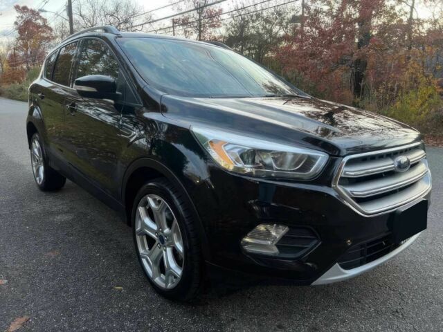 Черный Форд Эскейп, объемом двигателя 2 л и пробегом 64 тыс. км за 8600 $, фото 2 на Automoto.ua