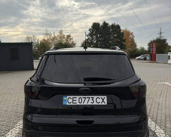 Черный Форд Эскейп, объемом двигателя 2 л и пробегом 74 тыс. км за 14650 $, фото 7 на Automoto.ua