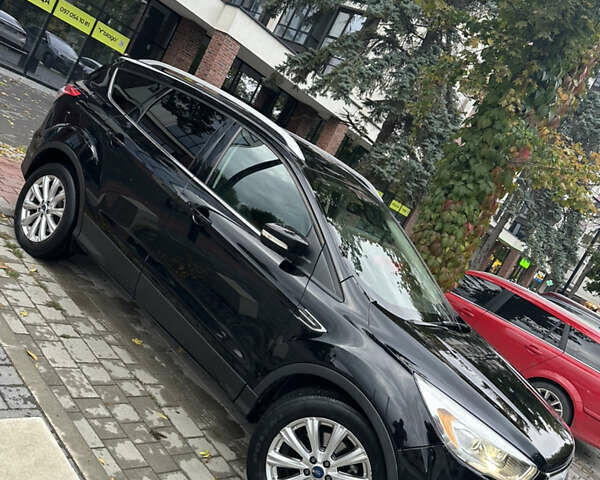 Черный Форд Эскейп, объемом двигателя 2 л и пробегом 208 тыс. км за 10999 $, фото 3 на Automoto.ua