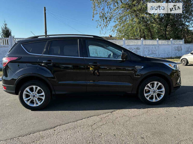 Черный Форд Эскейп, объемом двигателя 1.5 л и пробегом 128 тыс. км за 11300 $, фото 10 на Automoto.ua
