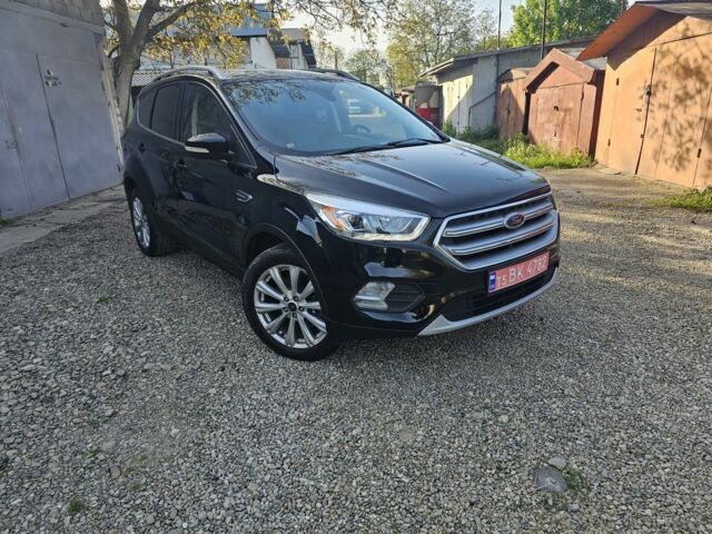 Черный Форд Эскейп, объемом двигателя 2 л и пробегом 194 тыс. км за 12500 $, фото 1 на Automoto.ua