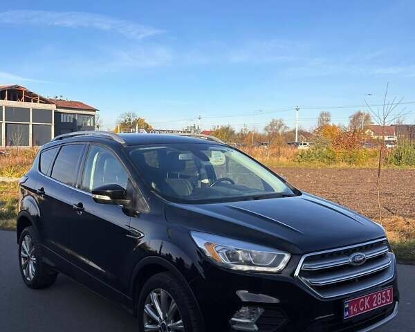 Чорний Форд Ескейп, об'ємом двигуна 1.5 л та пробігом 203 тис. км за 11999 $, фото 1 на Automoto.ua