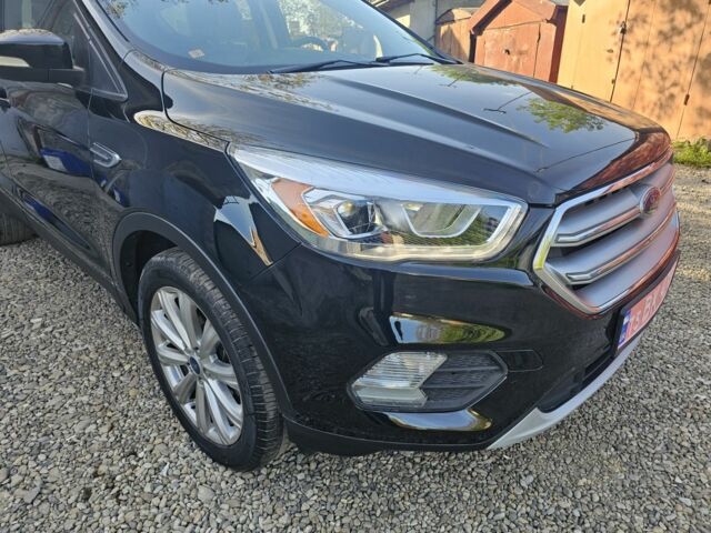 Черный Форд Эскейп, объемом двигателя 2 л и пробегом 194 тыс. км за 12500 $, фото 7 на Automoto.ua