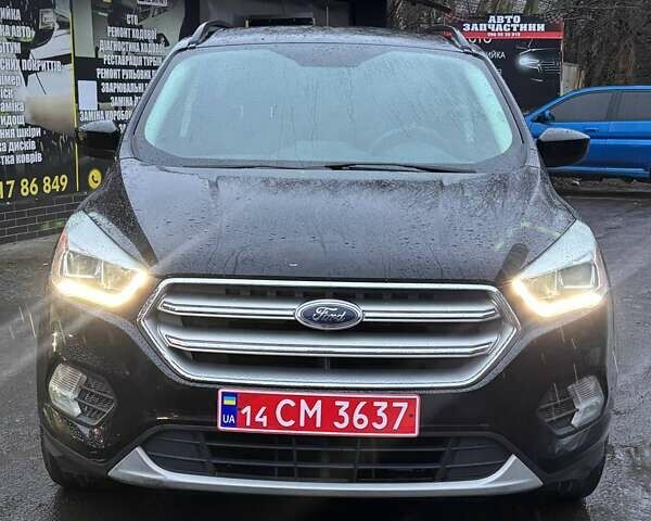 Чорний Форд Ескейп, об'ємом двигуна 1.5 л та пробігом 234 тис. км за 10899 $, фото 1 на Automoto.ua