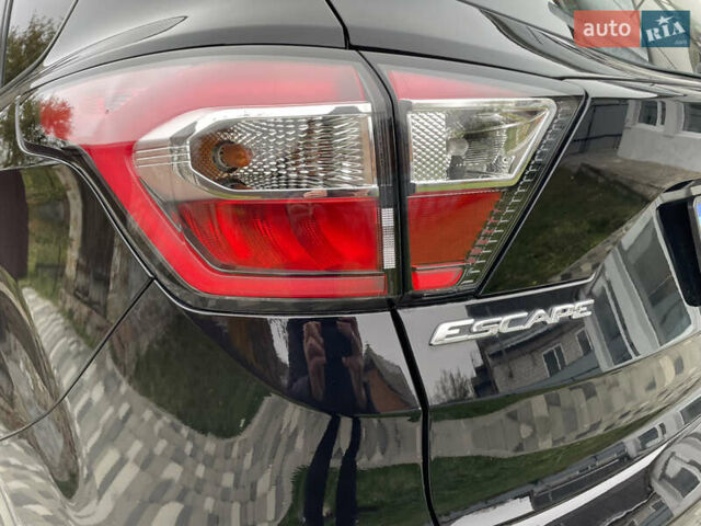 Черный Форд Эскейп, объемом двигателя 2.5 л и пробегом 197 тыс. км за 13000 $, фото 31 на Automoto.ua