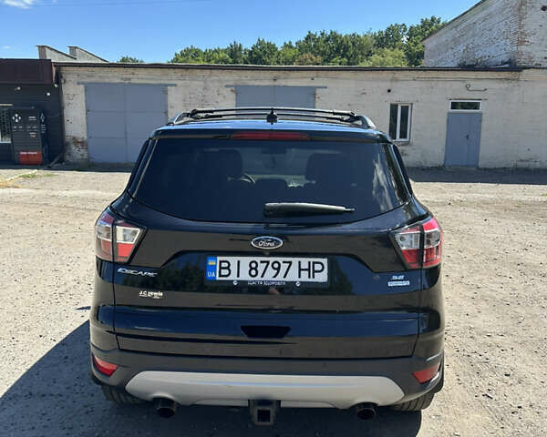 Черный Форд Эскейп, объемом двигателя 2 л и пробегом 111 тыс. км за 13300 $, фото 4 на Automoto.ua