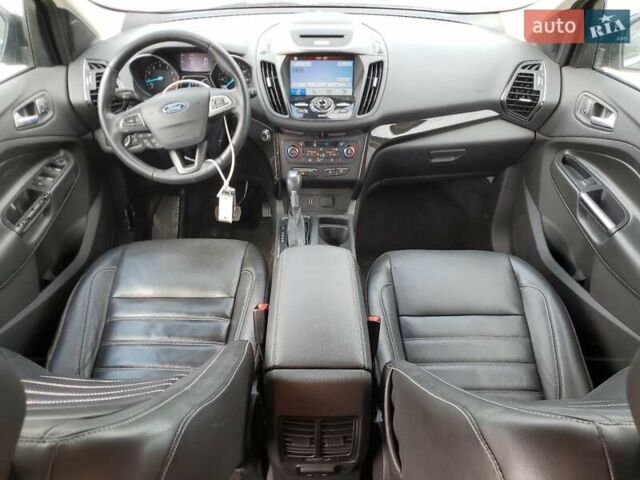 Черный Форд Эскейп, объемом двигателя 2 л и пробегом 78 тыс. км за 1200 $, фото 7 на Automoto.ua