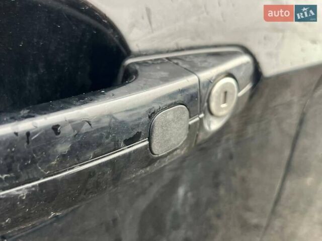 Черный Форд Эскейп, объемом двигателя 2 л и пробегом 194 тыс. км за 9600 $, фото 10 на Automoto.ua