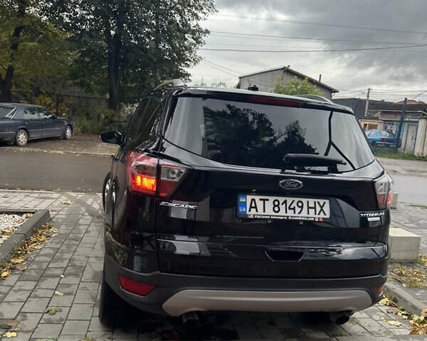 Черный Форд Эскейп, объемом двигателя 2 л и пробегом 208 тыс. км за 10999 $, фото 6 на Automoto.ua