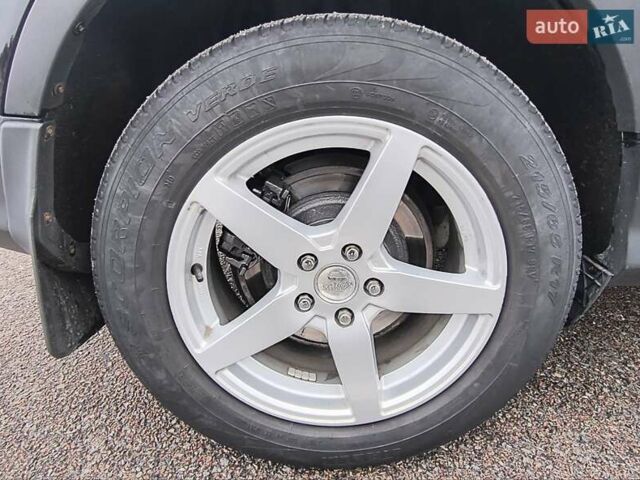 Черный Форд Эскейп, объемом двигателя 2 л и пробегом 232 тыс. км за 10000 $, фото 29 на Automoto.ua