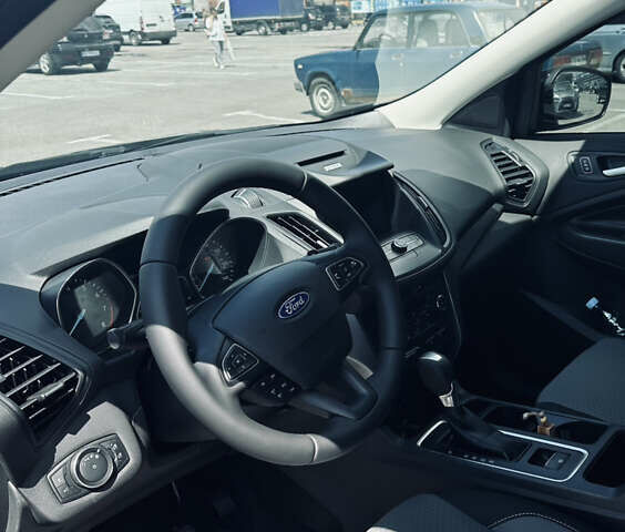 Чорний Форд Ескейп, об'ємом двигуна 2 л та пробігом 125 тис. км за 13999 $, фото 5 на Automoto.ua