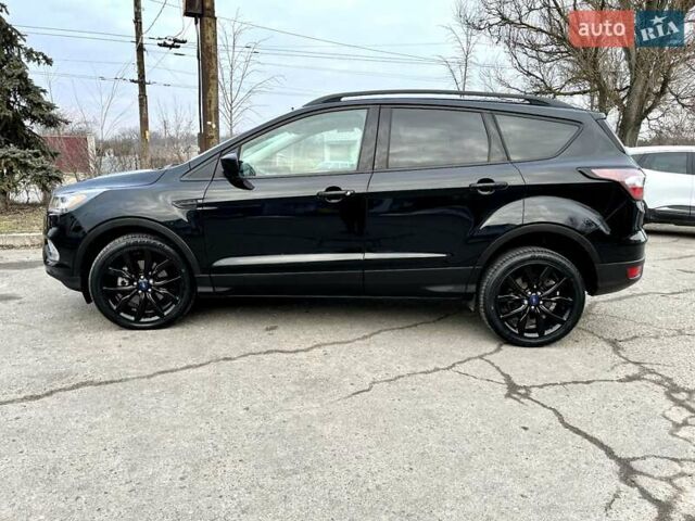 Чорний Форд Ескейп, об'ємом двигуна 2 л та пробігом 83 тис. км за 16900 $, фото 3 на Automoto.ua