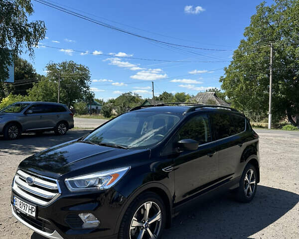 Черный Форд Эскейп, объемом двигателя 2 л и пробегом 111 тыс. км за 13300 $, фото 1 на Automoto.ua