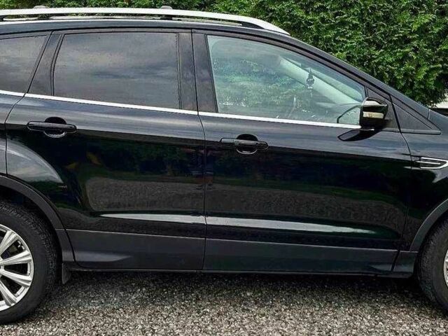 Черный Форд Эскейп, объемом двигателя 2 л и пробегом 134 тыс. км за 8400 $, фото 4 на Automoto.ua