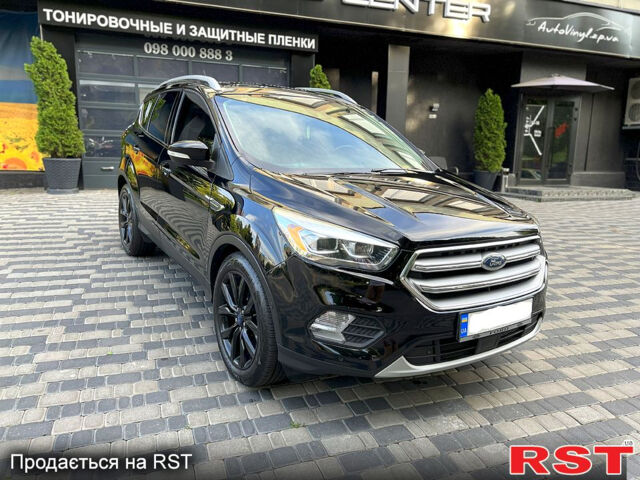 Черный Форд Эскейп, объемом двигателя 2 л и пробегом 135 тыс. км за 16000 $, фото 5 на Automoto.ua
