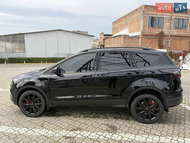 Черный Форд Эскейп, объемом двигателя 2 л и пробегом 74 тыс. км за 14650 $, фото 4 на Automoto.ua