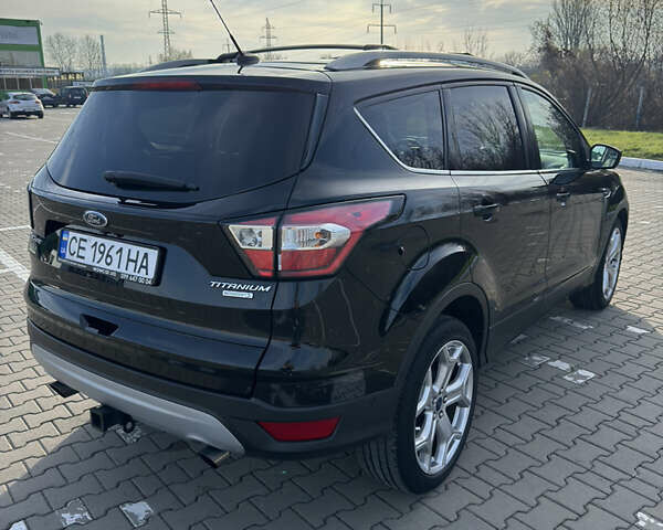 Черный Форд Эскейп, объемом двигателя 2 л и пробегом 33 тыс. км за 17000 $, фото 2 на Automoto.ua