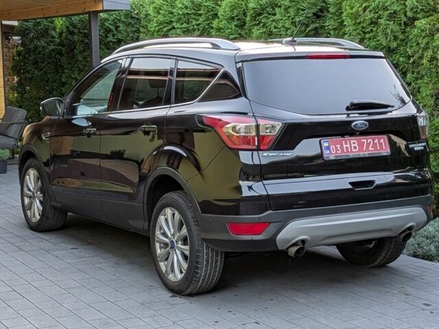 Чорний Форд Ескейп, об'ємом двигуна 1.5 л та пробігом 200 тис. км за 11900 $, фото 1 на Automoto.ua