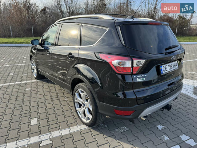 Черный Форд Эскейп, объемом двигателя 2 л и пробегом 33 тыс. км за 17000 $, фото 3 на Automoto.ua