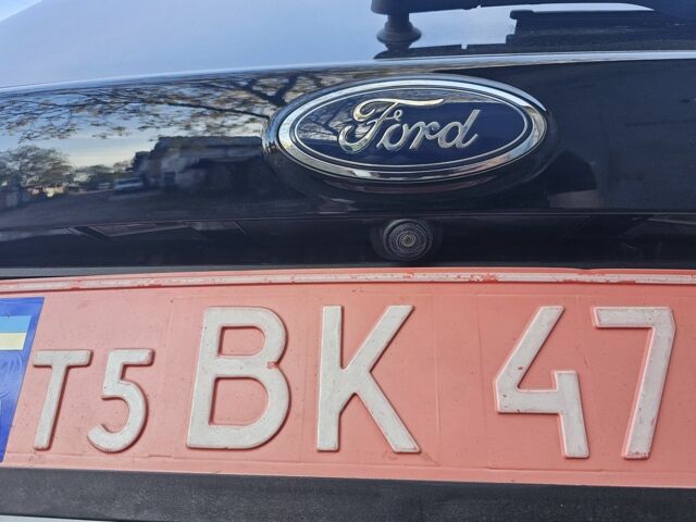 Черный Форд Эскейп, объемом двигателя 2 л и пробегом 194 тыс. км за 12500 $, фото 15 на Automoto.ua