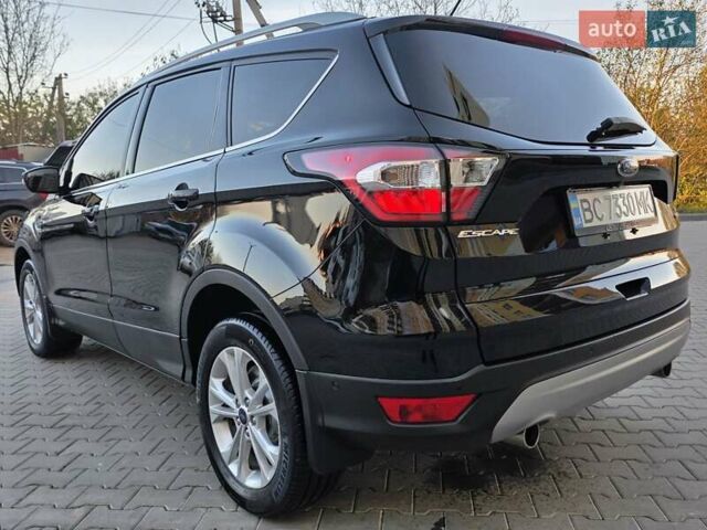 Черный Форд Эскейп, объемом двигателя 1.5 л и пробегом 106 тыс. км за 10999 $, фото 2 на Automoto.ua