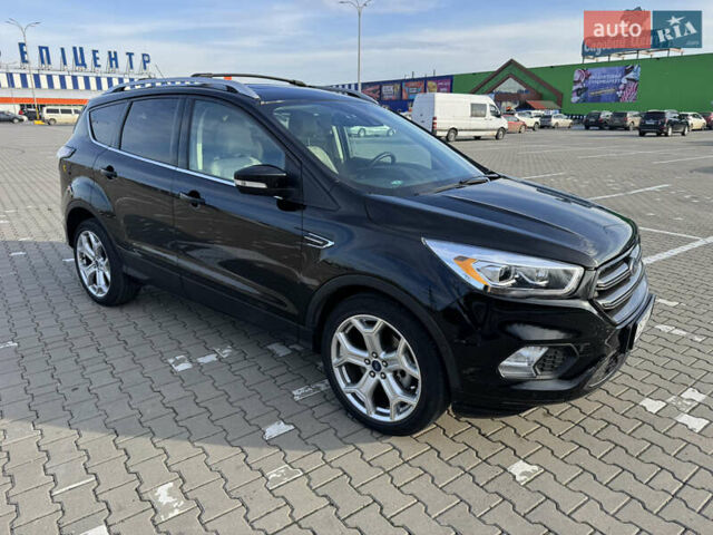 Черный Форд Эскейп, объемом двигателя 2 л и пробегом 33 тыс. км за 17000 $, фото 7 на Automoto.ua